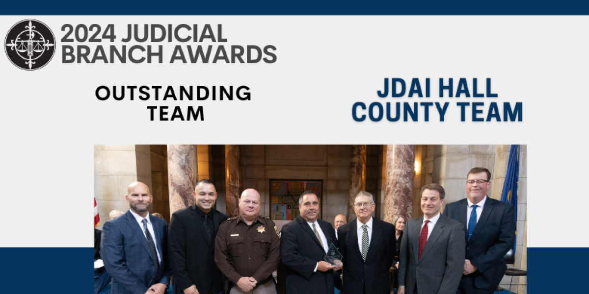 Photo, from left: Marc Kohmetscher, James Schulte, Sheriff Rick Conrad, Martin Klein, former Chief Justice Mike Heavican, Judge Alfred Corey, and Judge Brian McQuay.