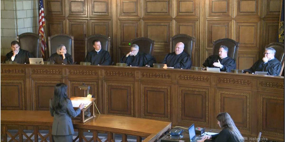 Lancaster County District Judge Post sits with Nebraska Supreme Court