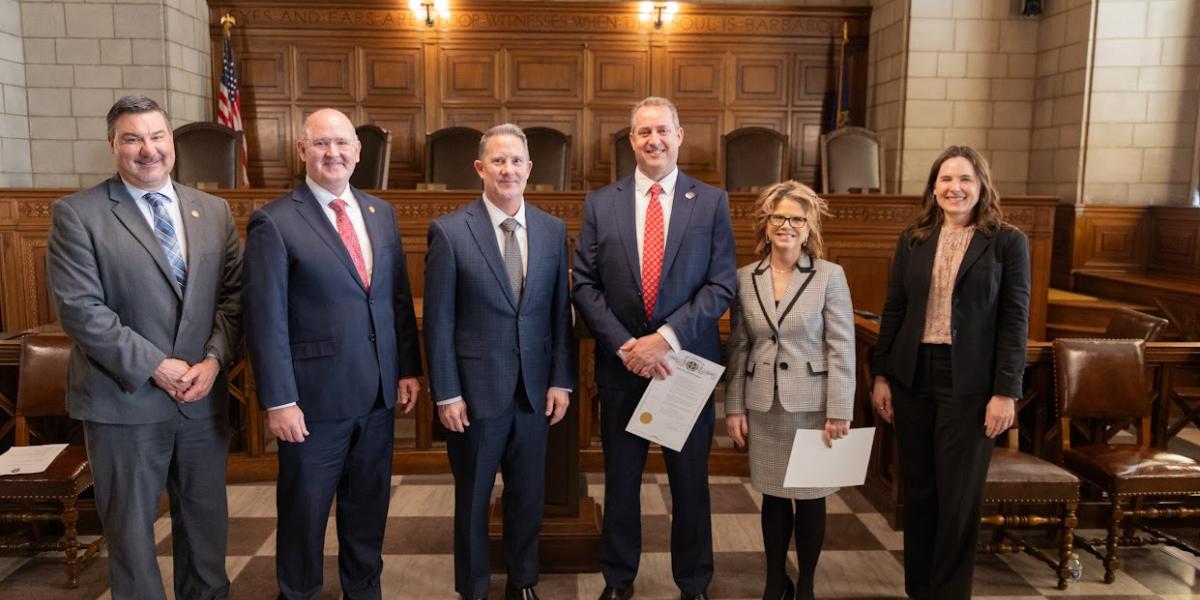 State Court Administrator Corey Steel, Justice Jason Bergevin, Chief Justice Jeffrey Funke, Judge David Bargen, Judge Holly Parsley, Deputy Administrator for Court Services Amy Prenda