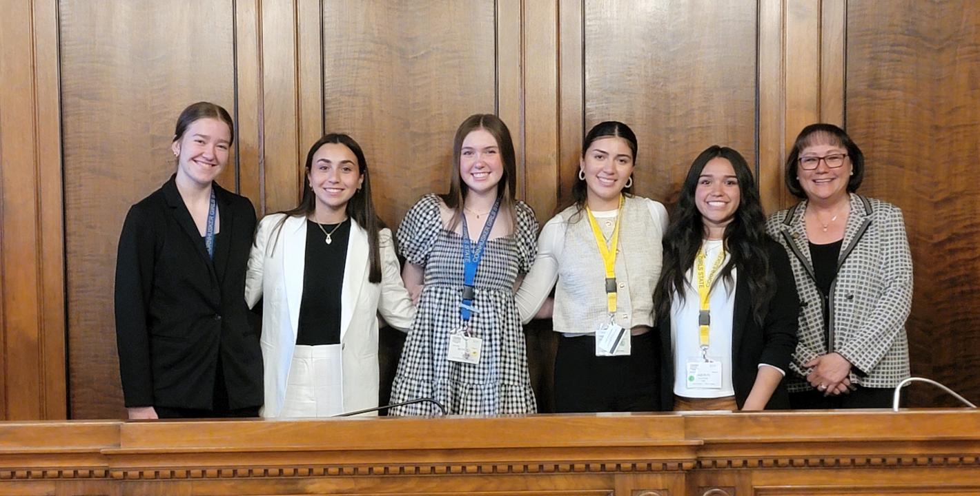 photo (L to R): Isabel Belina, Anna Zuber, Bethany Budell, Daniela Cortes, and Jaquelin Luna with Judge Riko Bishop.
