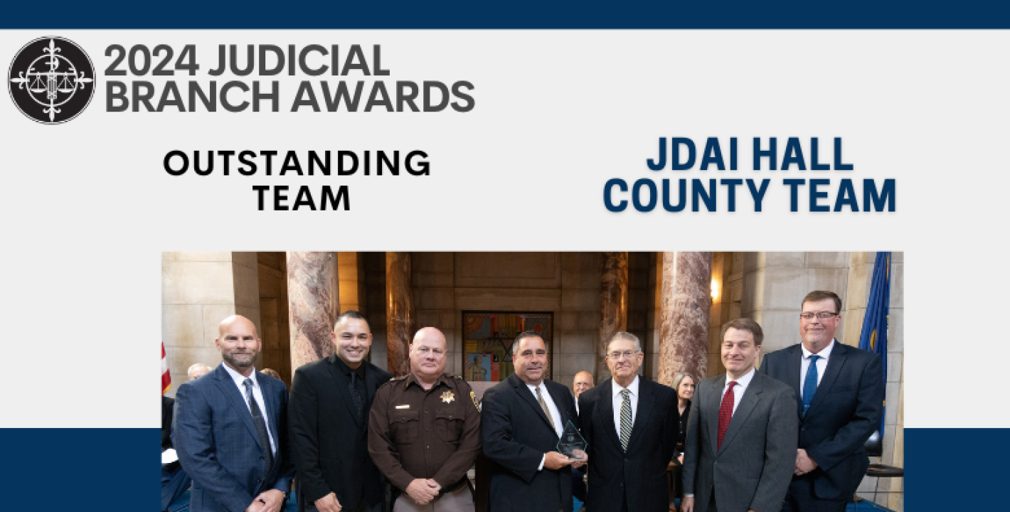 Photo, from left: Marc Kohmetscher, James Schulte, Sheriff Rick Conrad, Martin Klein, former Chief Justice Mike Heavican, Judge Alfred Corey, and Judge Brian McQuay.