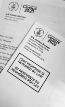 white printer paper with black text about 2020 Census