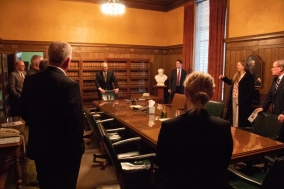 Chief Justice Heavican shows the consultation room to senators
