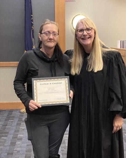 Photo: Judge Rachel Daugherty with graduate Jamie