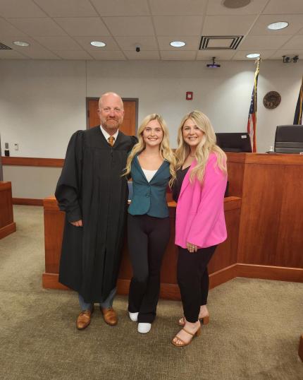 Photo (L-R): Judge Jonathan Crosby, Graduate Preslee, and Probation Officer Madison Niedermeyer.