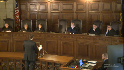 District Judge J. Michael Coffey Sits with Nebraska Supreme Court