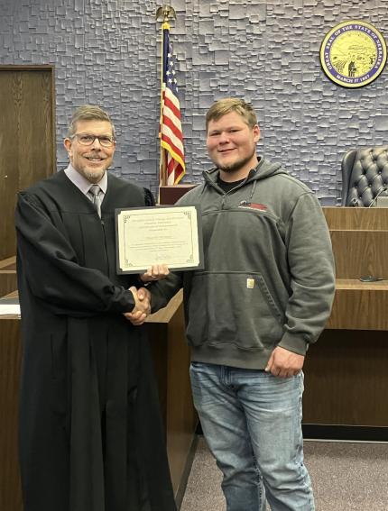 Judge James Masteller with graduate Max