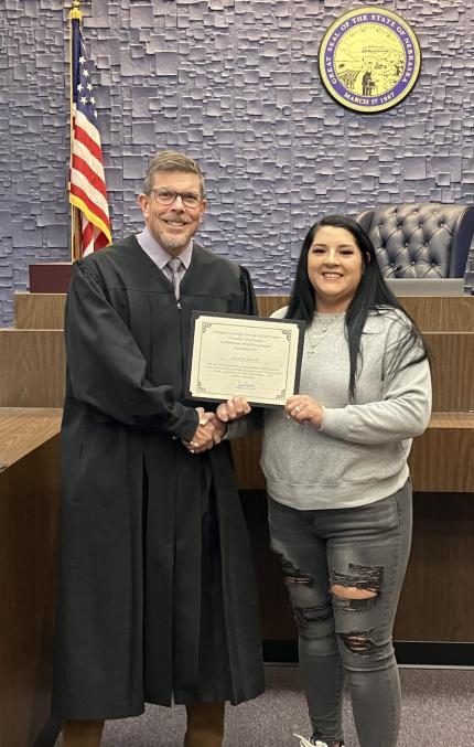 Judge James Masteller with graduate Jessalyn