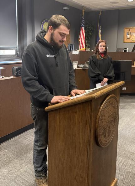 Photo L to R: graduate Chevy and Judge Shelly Stratman.