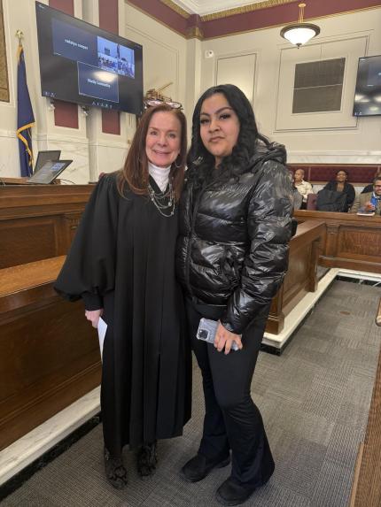 Photo: Judge Shelly Stratman with graduate Ana.