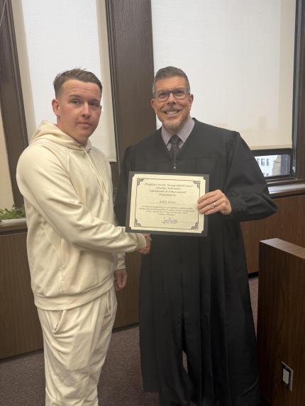 Graduate Jayden and Judge James Masteller