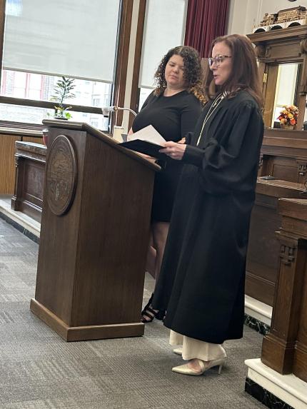 Photo: Judge Shelly Stratman with graduate Mia.