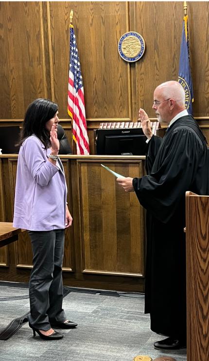 Swearing-in ceremony for Crystal Hestekind as Chief Probation Officer of District 7. Judge James Kube administered the oath of office.