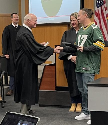 Judge John A. Colborn with graduate