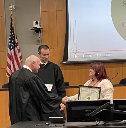 Judge John A. Colborn with graduate