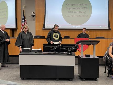 Judge John A. Colborn with graduate