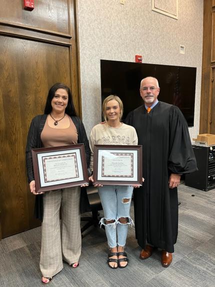 Graduates Megan and Alexandra, and Judge Kube (9/6/24)