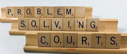 scrabble tiles, problem-solving courts