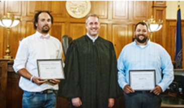 Graduate James, Judge David Bargen, and graduate Rhory. Picture Courtesy of Wilbur Republican.