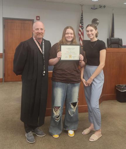 Photo (L to R): Judge Jonathan Crosby, Graduate Tierra, and Probation Officer Kasey Stallbaum.