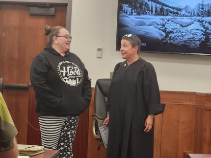 Photo: Graduate Emilee, and Judge Stefanie Martinez. 