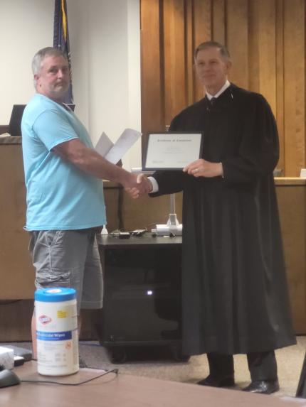 Judge Stecker with graduate, Michael.