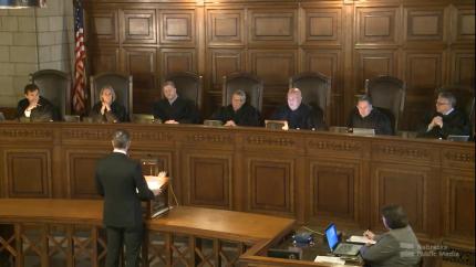 District Judge Ryan C. Carson Sits with Nebraska Supreme Court