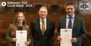 Buethe, Heavican, and Gonzales with proclamation. Text: Nebraska Trial Court Week, 2024